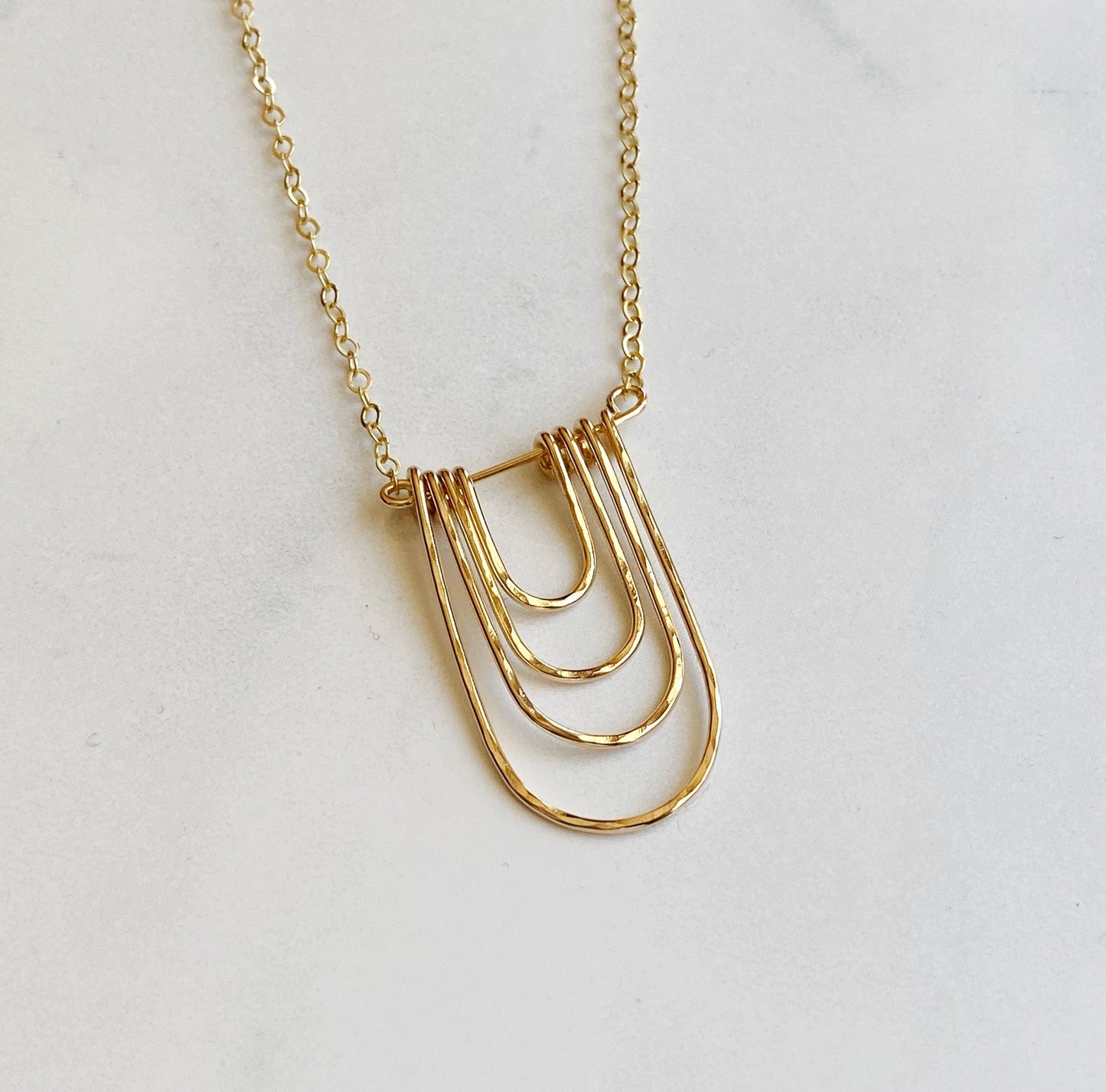 Modern arc necklace